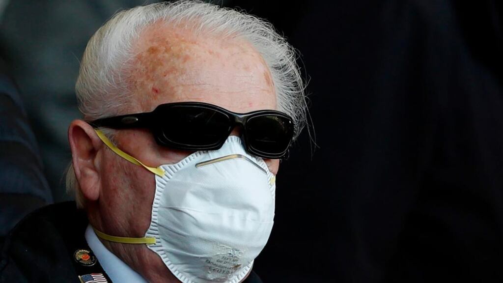 The World Health Organisation is clear that people with no respiratory symptoms, such as cough, do not need to wear face masks. Photograph: Adrian Dennis