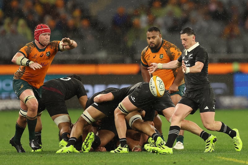 Cam Roigard of the All Blacks kicks the ball against Australia. Photograph: Janelle St Pierre/Getty