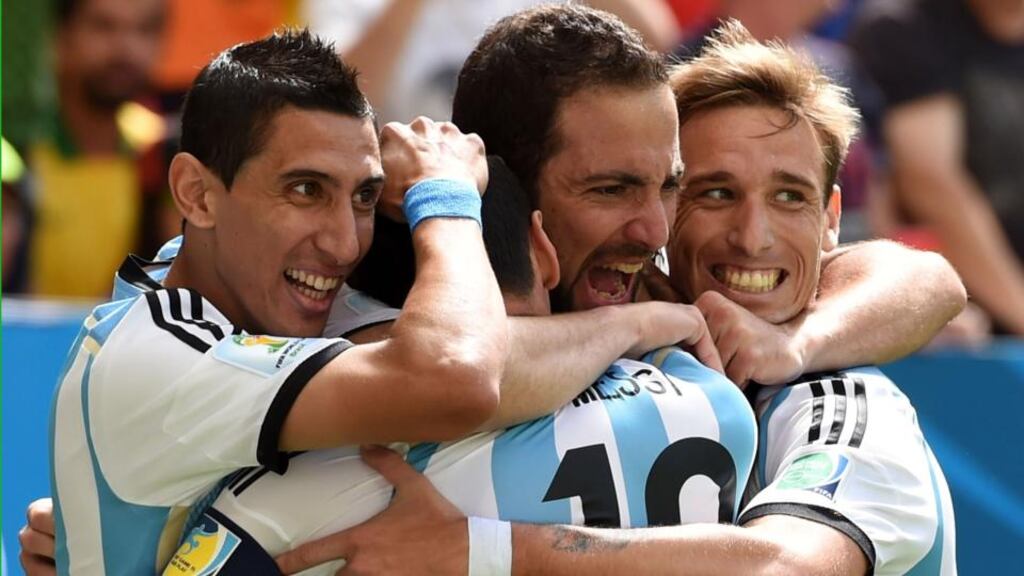 Gonzalo Higuain of Argentina (second right) celebrates scoring against Belgium with Angel di Maria (left), Lionel Messi (second left) and Lucas Biglia at Estadio Nacional in Brasilia. Photograph: Matthias Hangst / Getty Images