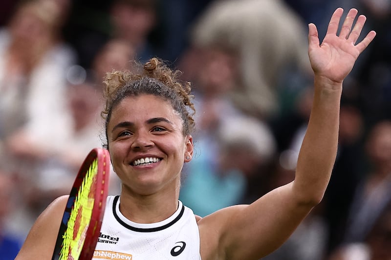 Italy's Jasmine Paolini celebrates winning against USA's Emma Navarro. Photograph: Henry Nicholls/AFP via Getty