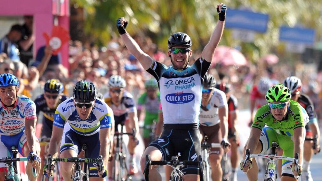 Mark Cavendish celebrates as he crosses the finish line to win the sixth stage of the Giro d’Italia from Mola di Bari to Margherita di Savoia. Photograph: PA