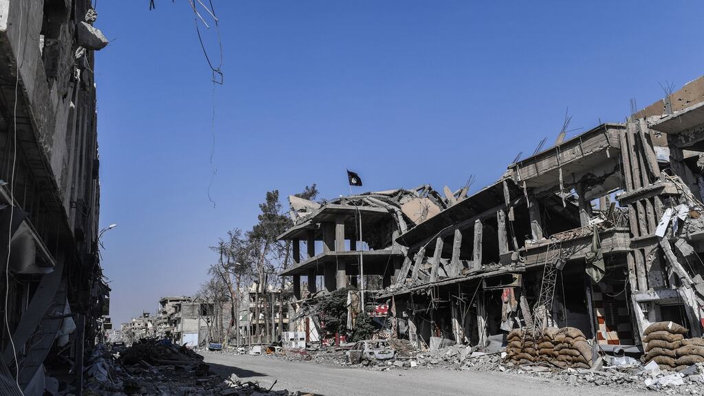 Heavily damaged buildings in Raqa on October 21st, 2017, after a Kurd-led force expelled the jihadists from the northern Syrian city. There are claims many were transported out. Photograph: Bulent Kilic/AFP/Getty