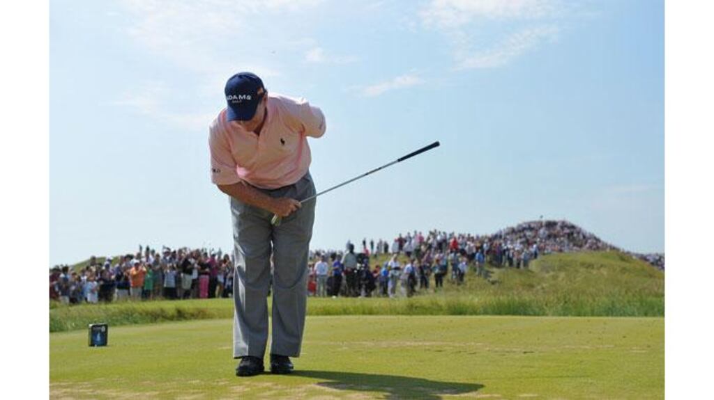 Tom Watson of the United States takes a bow after his hole in one at the sixth during the second round of The 140th Open Championship at Royal St George's on July 15th, 2011. - (Photograph: Stuart Franklin/Getty Images)