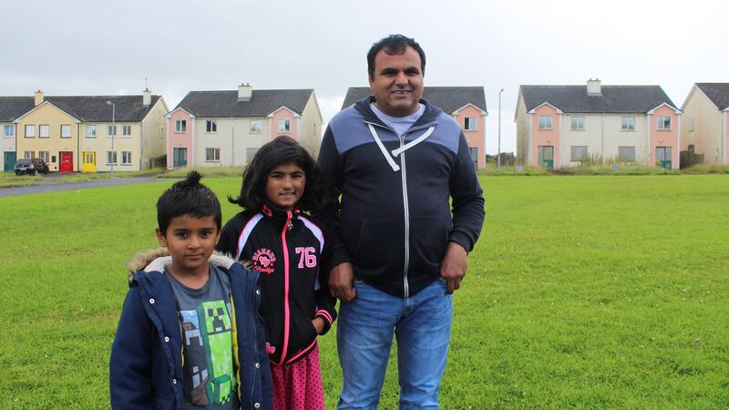 Members of the Gul family, Almasyounus (father), Yousaf and Maryam, residents in Shannon Valley “ghost estate” outside Ballaghaderreen, Co Roscommon. Photograph: Simon Carswell