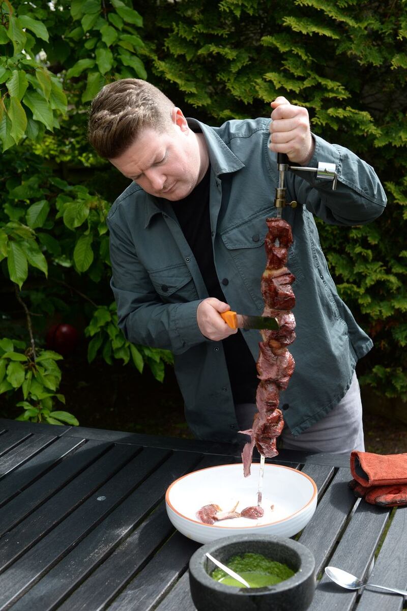 Spit roast lamb from the barbecue.