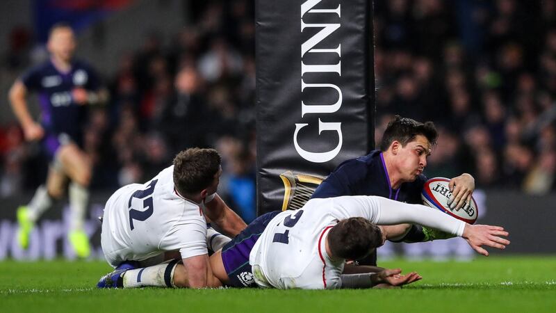 Sam Johnson scores a try to give Scotland the lead in the Six Nations game against Scotland at Twickenham. Photograph: Ryan Byrne/Inpho