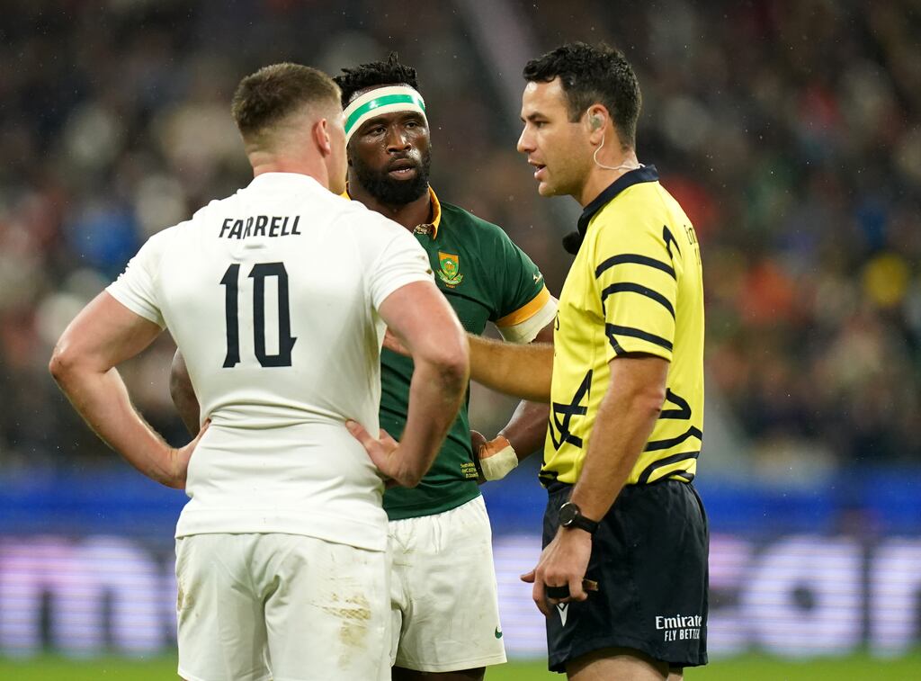 Referee Ben O’Keeffe speaks with England's Owen Farrell (left) and South Africa's Siya Kolisi during the Rugby World Cup semi-final. Photograph: Adam Davy/PA
