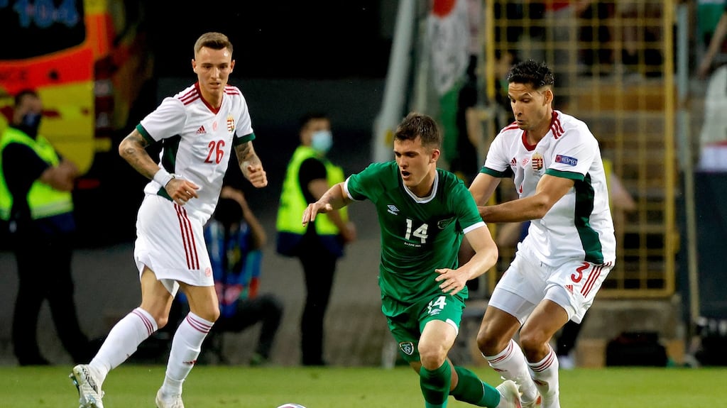 Jason Knight is challenged Akos Kecskes during Ireland’s goalless draw with Hungary. Photograph: Laszlo Szirtesi/Getty