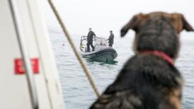 Silence at Baltimore as divers return with body of Barry Davis Ryan