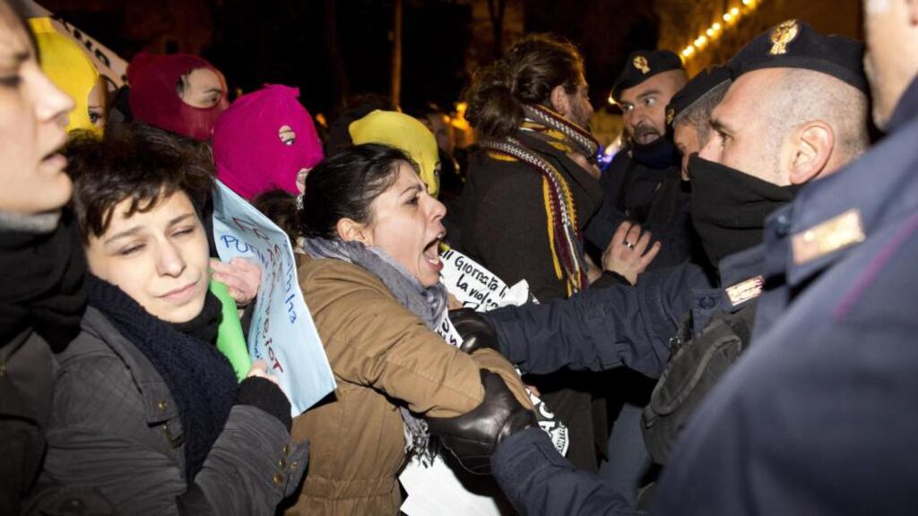 A group of people protest in support of Pussy Riot, the Russian feminist punk rock protest group, during the meeting between Russian president Vladimir Putin and Italian president Giorgio Napolitano near Quirinale palace in Rome. Photograph: Guido Montani/EPA