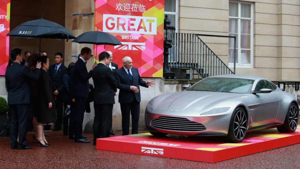 Chinese premier Xi Jinping with the Aston Martin DB10 during his state visit in London: the sports car will feature in the new James Bond film, Spectre. Photograph: Chris Jackson/Getty Images