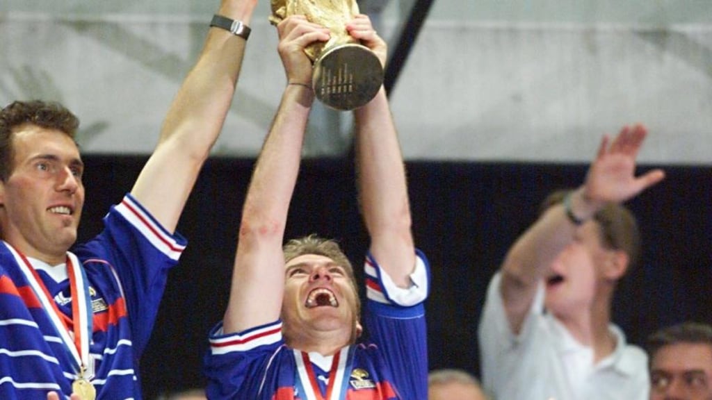 Didier Deschamps lifts the  Jules Rimet trophy at the Stade de France in 1998. The former France  captain could become just the third man to win the World Cup as a player and manager.  Photograph: Daniel Garcia/AFP/Getty Images