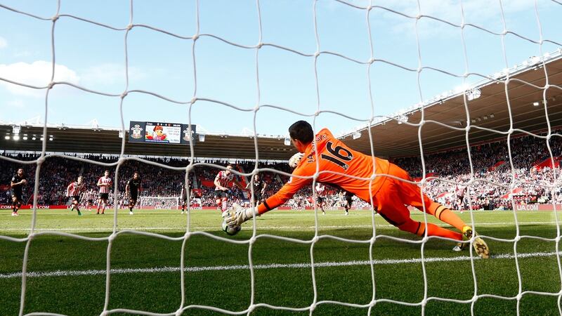 Eldin Jakupovic of Hull City saves a penalty from Dusan Tadic of Southampton. Photograph: Julian Finney/Getty Images
