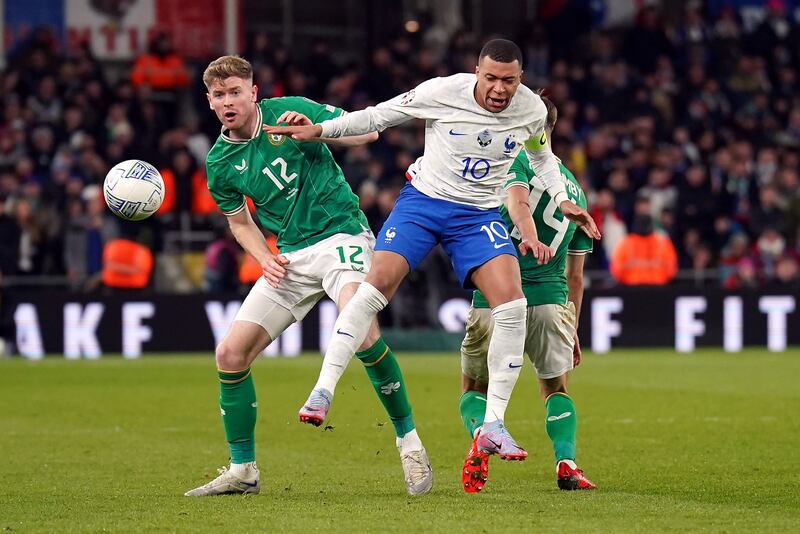 France's Kylian Mbappe battles for the ball with the Republic of Ireland's Nathan Collins during the UEFA Euro 2024 Group B qualifying match at the Aviva Stadium, Dublin. Photograph: PA