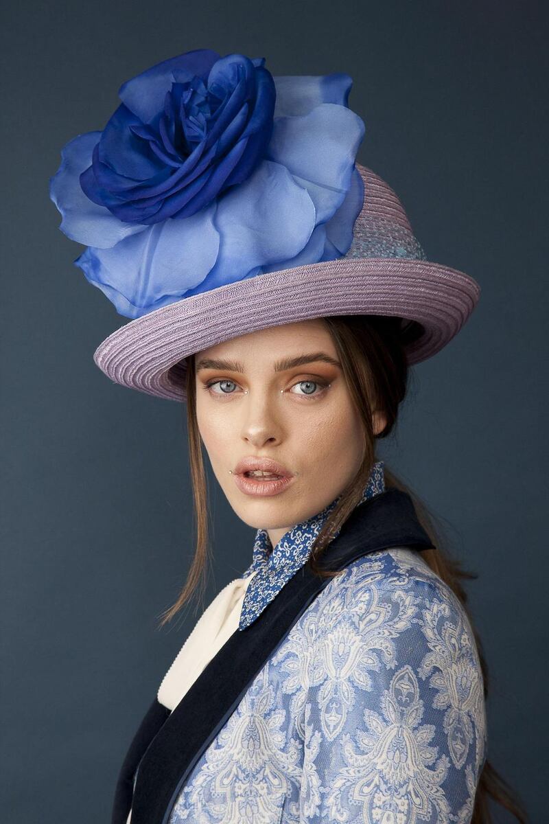 Oversize bowler with silk flower and netting by Anthony Peto €500. Photograph: Daniel Holfeld