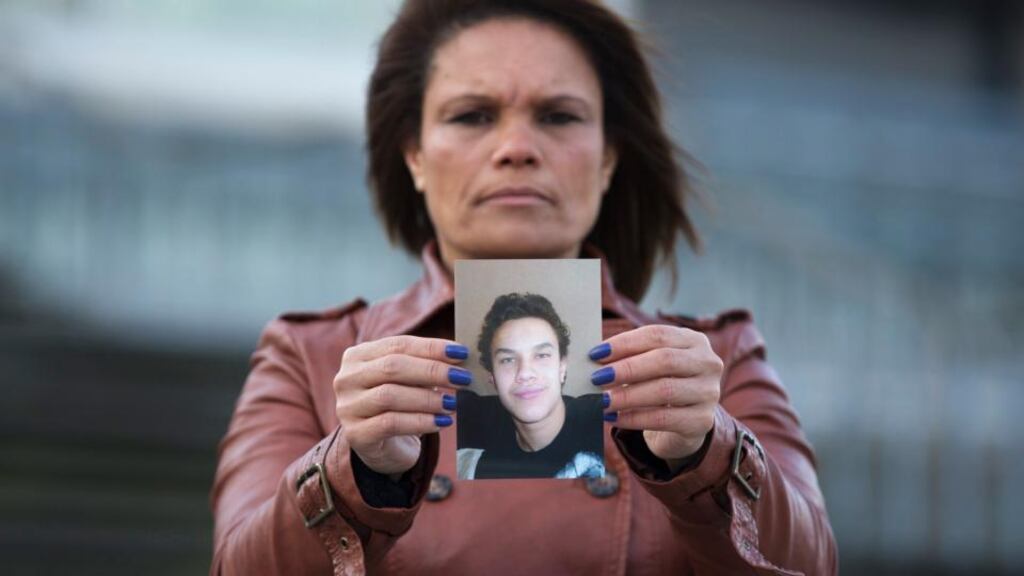 Ozana Rodrigues, the mother of Brian De Mulder, who left for Syria after being indoctrinated by Islamist group Sharia4Belgium, with a photo of her son. Photograph: Yves Herman/Reuters