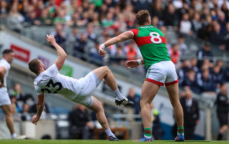 Mayo’s Aidan O'Shea in action against Kildare's Neil Flynn at Croke Park.  Mayo will need a major improvement if they are to trouble favourites Kerry in the quarter-final. Photograph: Evan Treacy/Inpho