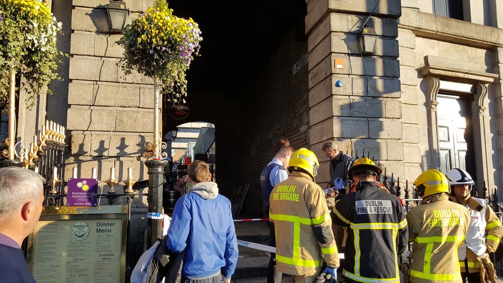 Two people have been taken to hospital with injuries after the apparent partial collapse of an archway in Temple Bar, Dublin. Photograph: Damian Cullen.
