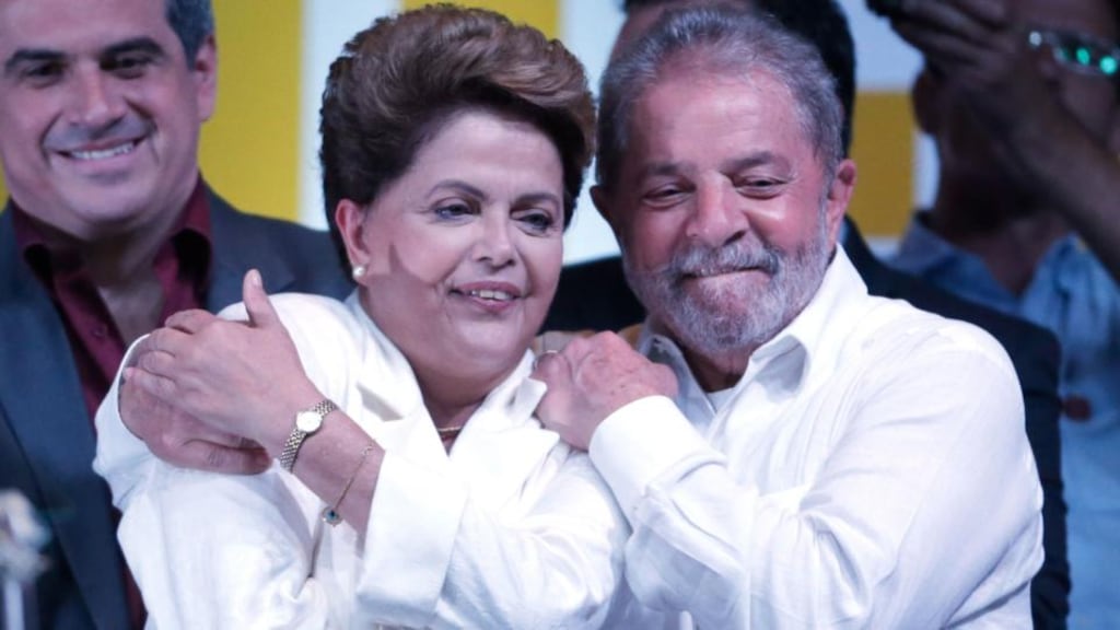 Dilma Rousseff celebrates victory with her mentor Lula da Silva, who campaigned tirelessly for her election. Photograph: AP Photo/Eraldo Peres