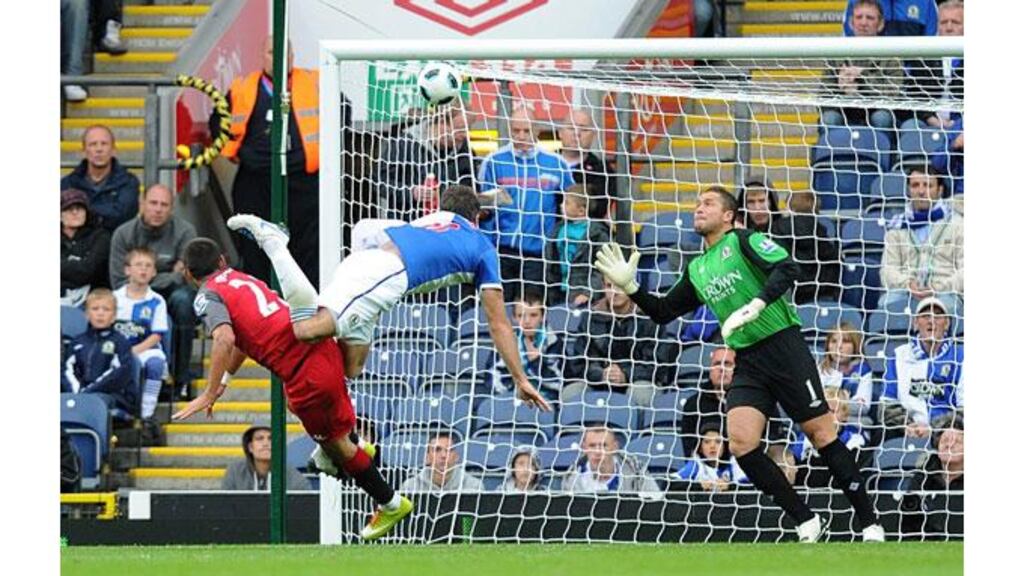 Fulham's Clint Dempsey scores an equaliser during the Barclays Premier League match against Blackburn Rovers at Ewood Park. - (Photograph: Martin Rickett/PA Wire)