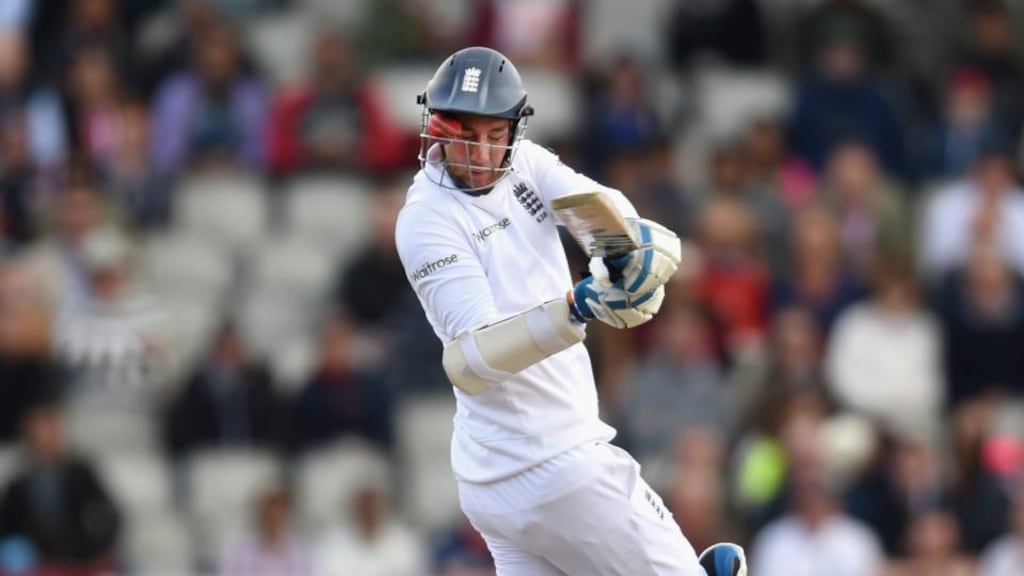 England batsman Stuart Broad is hit by a ball through the grill of his helmet from Varun Aaron, sustaining an injury to his nose during day three of the 4th Investec Test match between England and India at Old Trafford. Phot: Stu Forster/Getty Images