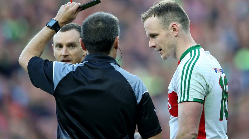 Referee Maurice Deegan shows Mayo goalkeeper goalkeeper Rob Hennelly a black card during the 2016 All-Ireland final defeat to Dublin. Photograph: Cathal Noonan/Inpho
