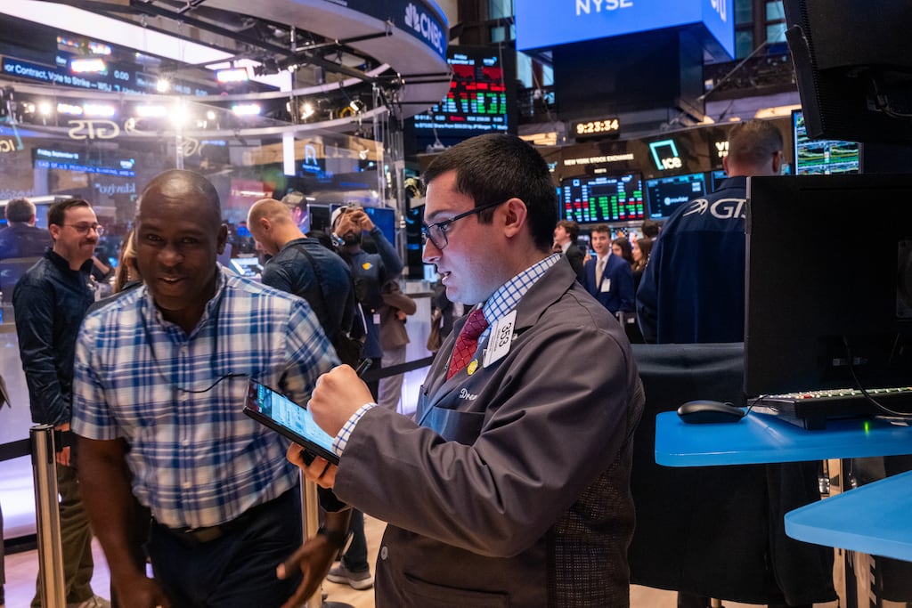 NEW YORK, NEW YORK - SEPTEMBER 13: Traders work on the New York Stock Exchange (NYSE) floor on September 13, 2024, in New York City. Stocks were up over 200 points in morning trading as the market continues to make weekly swings. (Photo by Spencer Platt/Getty Images)