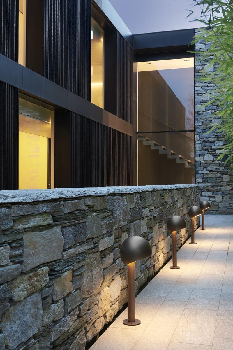 Standing 66cm high the cylindrical stem give way to an adjustable LED-lit semi-sphere that can direct the strip of light in various directions to highlight whatever is currently in bloom