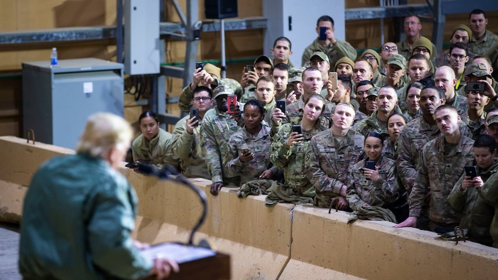 President Donald Trump during a surprise visit to at Al Asad Air Base in Iraq last year. Photograph: Al Drago/The New York Times