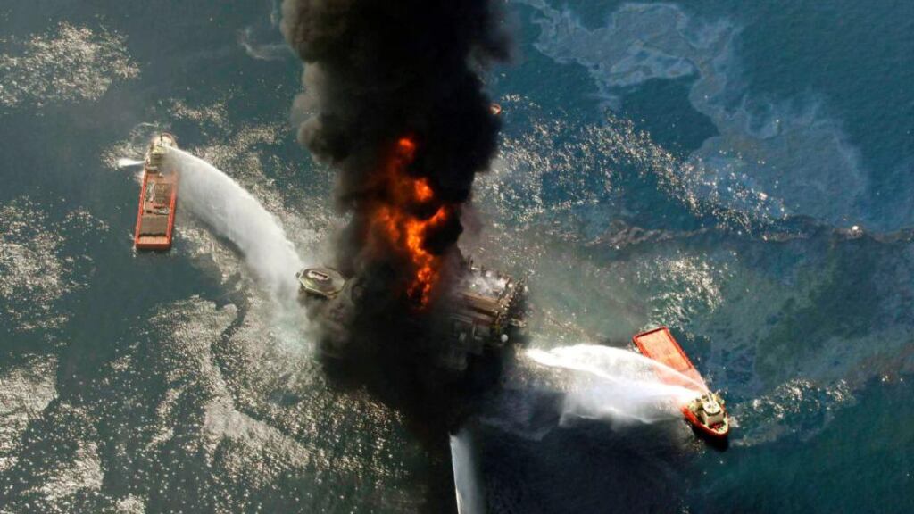 An April 21st, 2010,  file photograph of BP’s  Deepwater Horizon oil rig burning afer an  explosion in the Gulf of Mexico that claimed nine lives and resulted in a massive offshore oil spill.  Photograph: Gerald Herbert/AP
