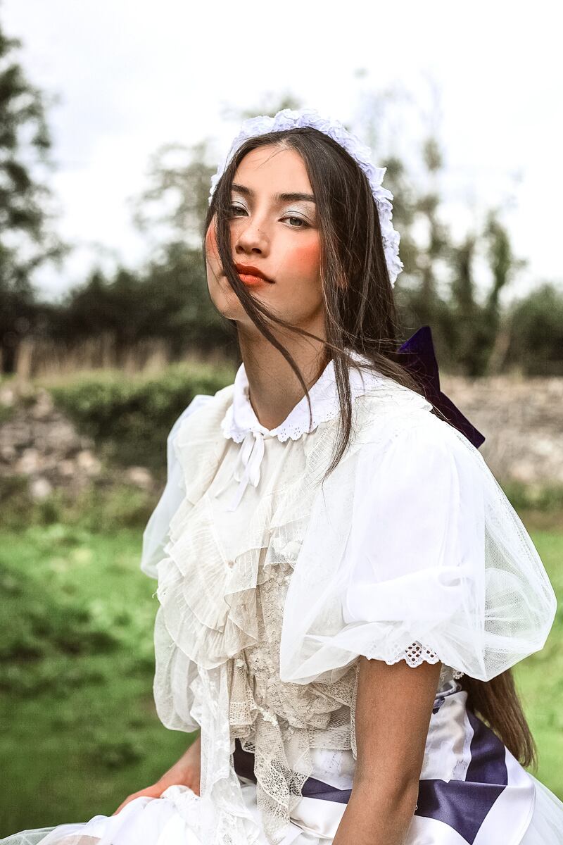 Living Green by photographer Aoife Casey – layered pieces by Sarah Caine, velvet hairbow by Aisling Kavanagh with styling by Vanessa Prezotto.