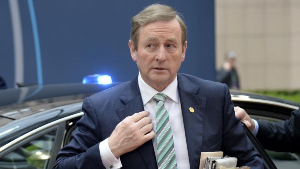 Taoiseach Enda Kenny talks of tax cuts on the back of successful negotiations with the commission. Photograph: Thierry Charlier/AFP/Getty Images