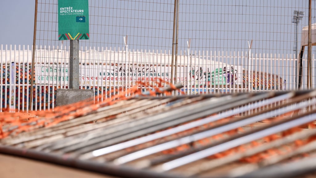 Crowd control barriers lie on the ground at the scene of the stampede at the entrance of Olembe stadium in Yaounde ahead of the African Cup of Nations match between hosts Cameroon and the Comoros Islands. Photograph: Kenzo Tribouillard/AFP via Getty Images