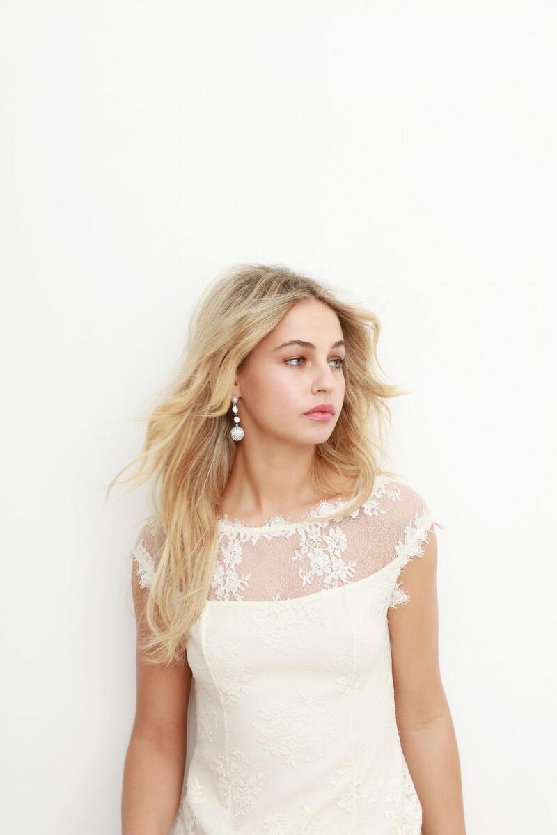 Fine lace ivory gown with beaded sheer upper basque neckline by Louise Kennedy