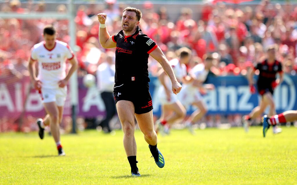 Sam Mulroy celebrates scoring the late free against Cork which sealed a dramatic victory for Louth at at Inniskeen, Monaghan. Photograph: Ryan Byrne/Inpho