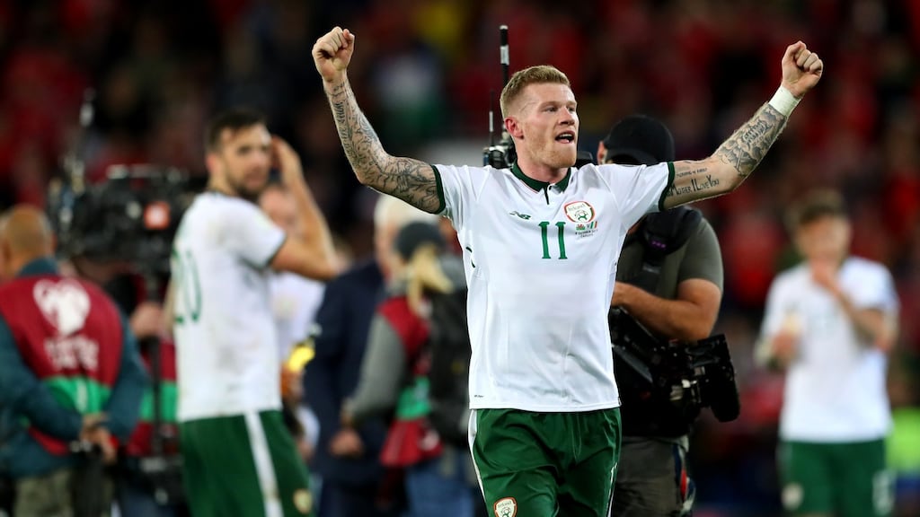 James McClean celebrates after his strike gave Ireland a 1-0 win over Wales in Cardiff and a place in the World Cup qualification play-offs. Photograph: James Crombie/Inpho.