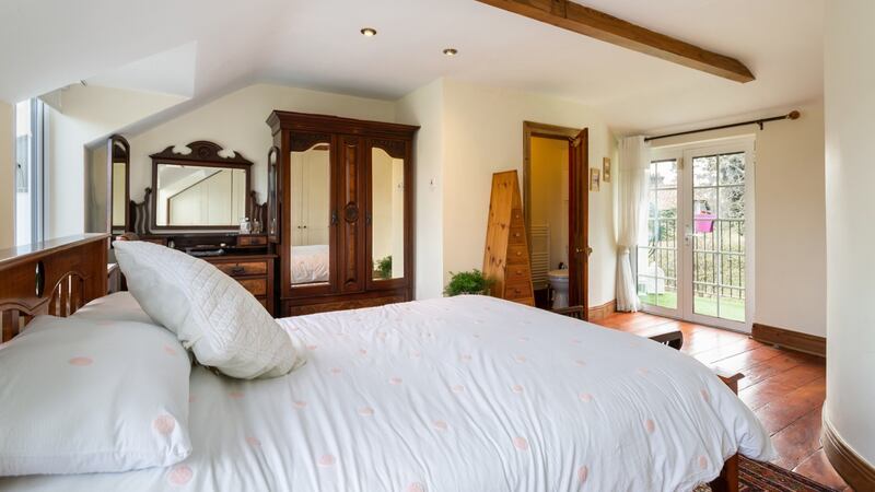 Main bedroom with balcony