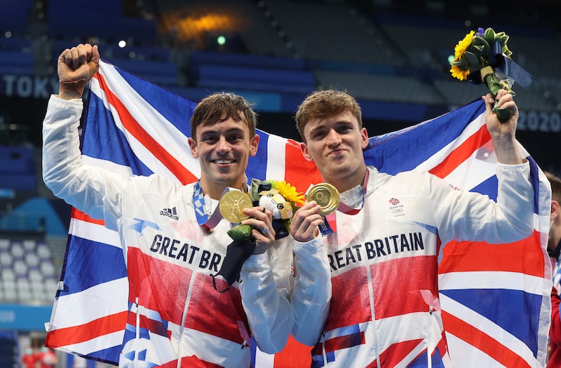 Daley and Matty Lee after winning gold in the men’s synchronised 10m platform diving final at the Olympics in Tokyo. Photograph: Clive Rose/Getty