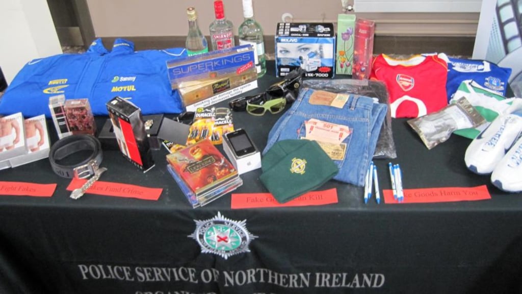 Some of the counterfeit goods seized by police and customs officials in Northern Ireland on show at the Organised Crime Task Force annual report launch at the Crumlin Road jail complex today. Photograph: Lesley-Anne McKeown/PA Wire