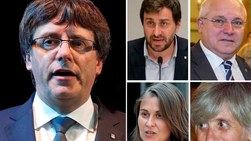 Carles Puigdemont (L) and the four former members of Catalan government who are in hiding: (top L-R) Antoni Comin, Lluis Puig, Meritxell Serret, and Clara Ponsati. Photograph: EPA