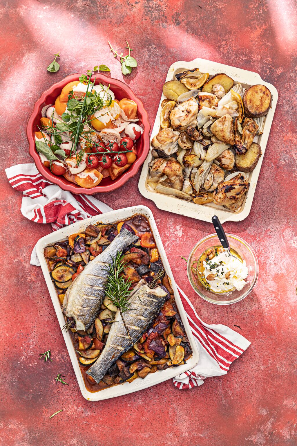 Baked fish on holiday ratatouille; chicken and fennel lyonnaise with roasted garlic and lemon creme fraiche; and tomato tonnato. Photograph: Harry Weir Photography