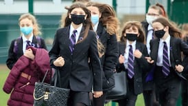 Schools in England to move some lessons online as Omicron surges