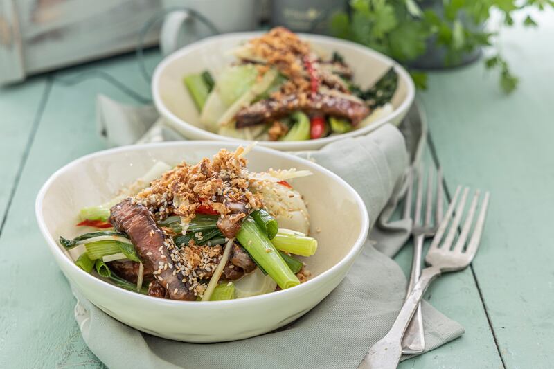 Peppered hoisin steak with pak choi, spring onions, chilli and ginger