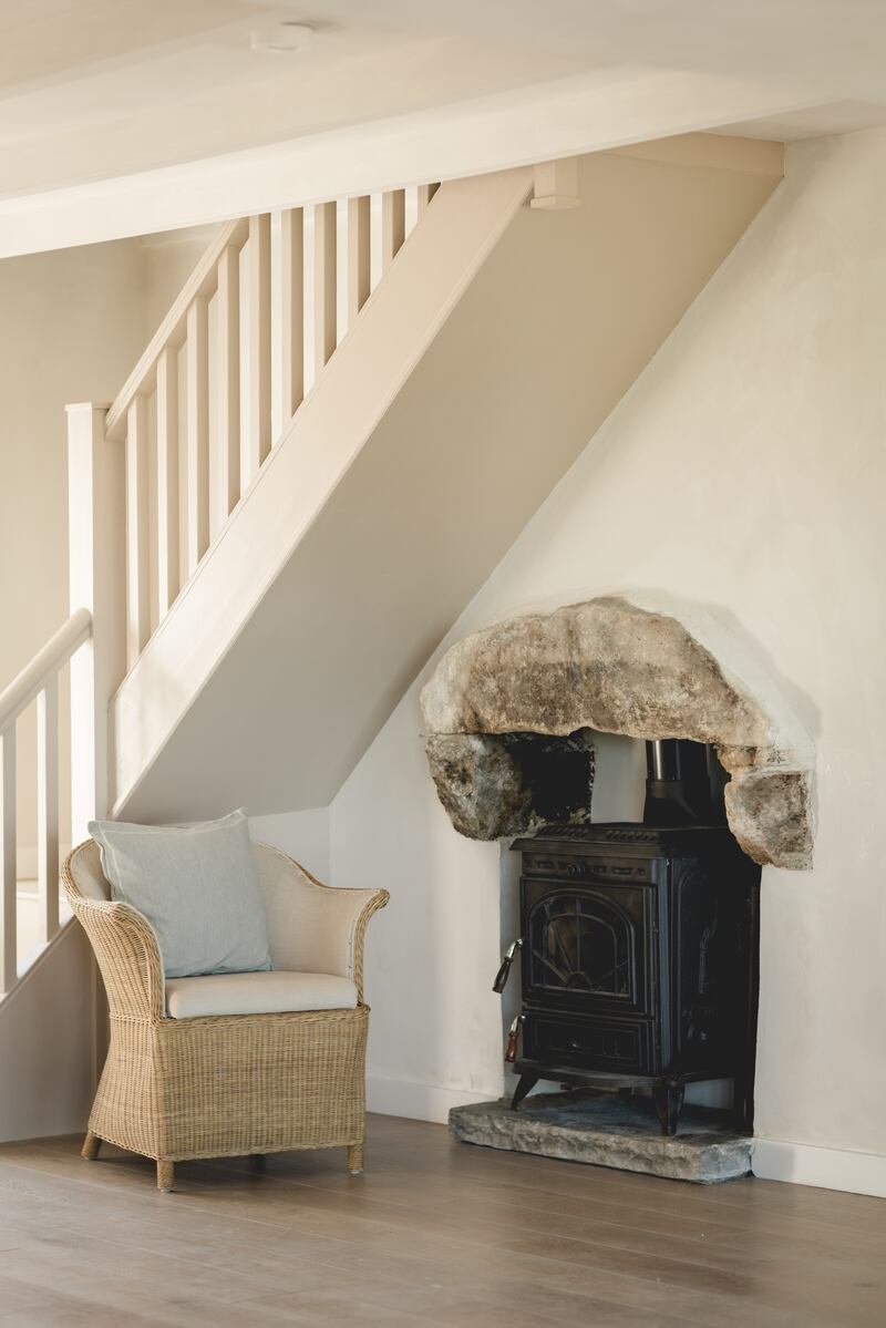 Wood-burning stove in entrance hall