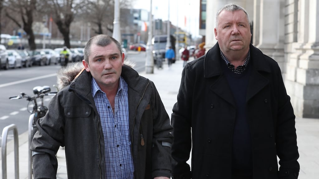 John Breen and George Davis leave the Four Courts after the  Circuit Civil Court action. Photograph: Collins Courts