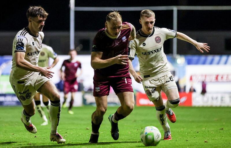 Galway United's Stephen Walsh takes on Bohemians duo Niall Morahan and Ross Tierney during Friday's Premier Division match at Eamonn Deacy Park. Photograph: Dan Clohessy/Inpho