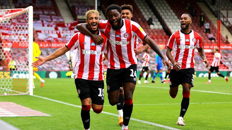 Brentford’s Said Benrahma (L) celebrates scoring his hat-trick with teammates Josh Da Silva and Ollie Watkins. Photograph: Aaron Chown/PA