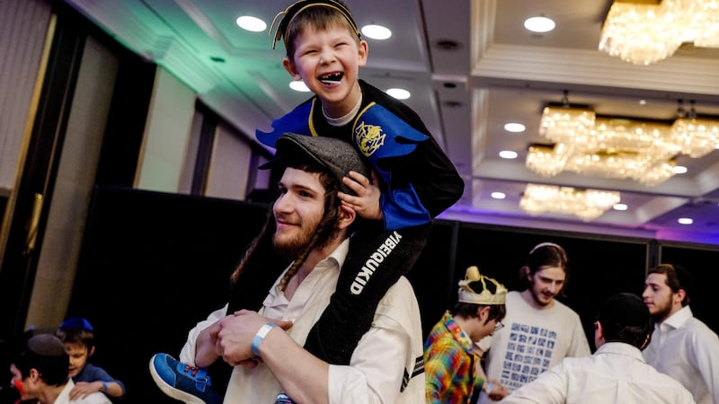 Jews celebrate Purim Holiday in Berlin with refugees from Odessa. Tens of thousands fleeing the war in Ukraine have arrived in recent weeks. Photograph: Filip Singer