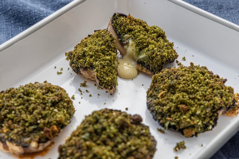 Stuffed baked Portobello mushrooms: mushrooms deliver flavour far beyond their price. Photograph: Harry Weir Photography