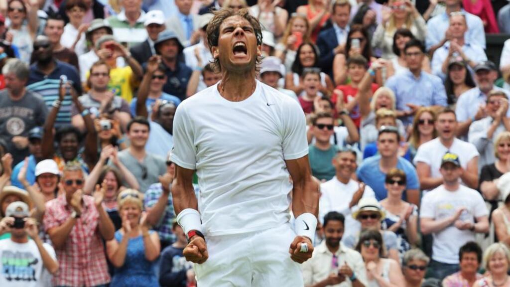 Rafael Nadal of Spain celebrates his win over Lukas Rosol of the Czech Republic in their second round match at Wimbledon. Photograph: Andy Rain/EPA